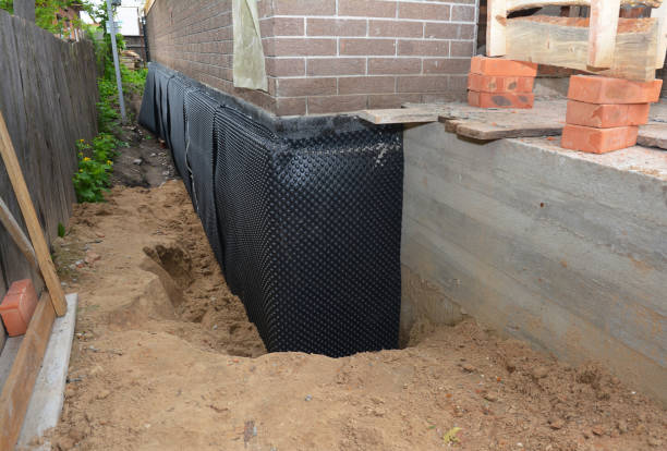Happy homeowners after waterproofing job in Groveland